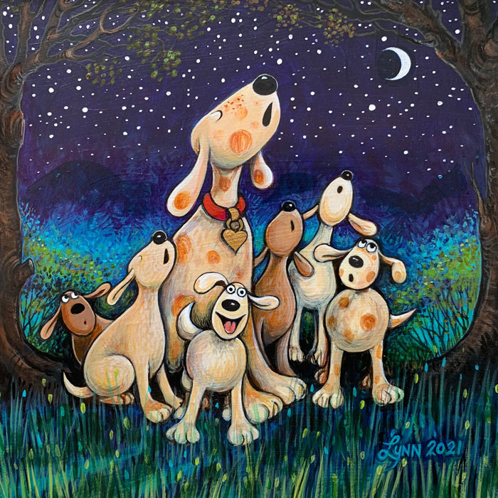 Mama dog and puppies howling at the moon